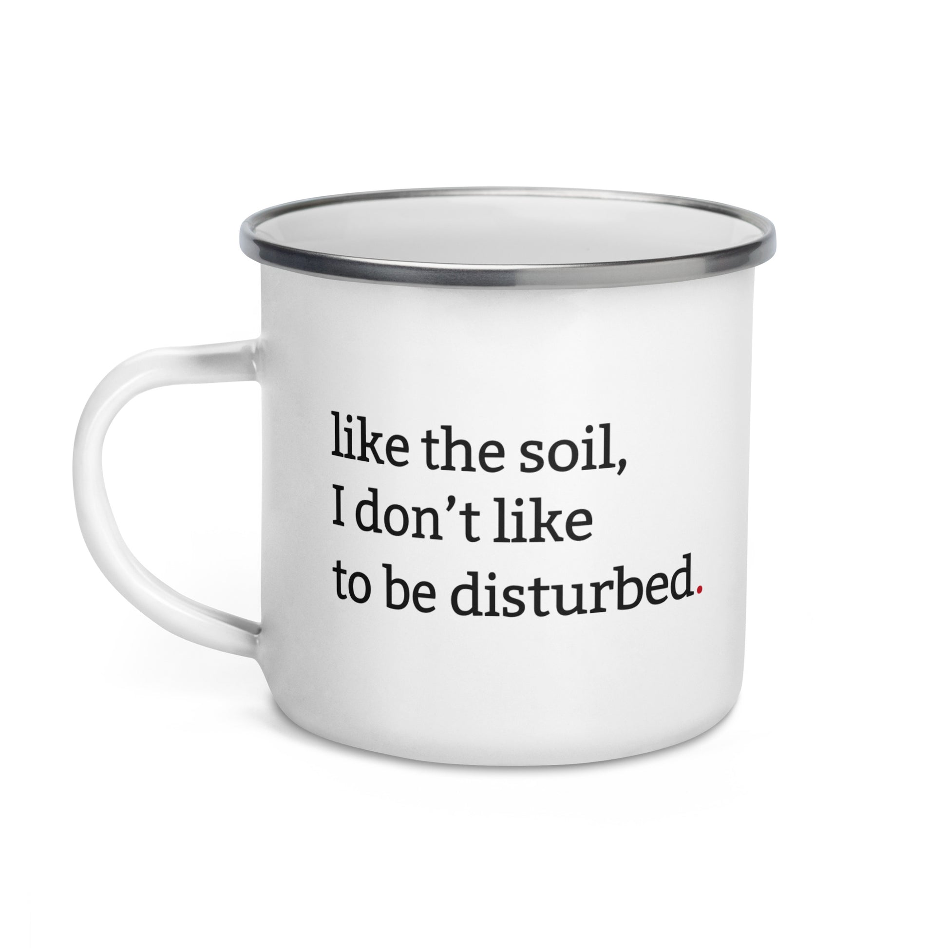 White enamel mug with black rim featuring “Like the soil I don’t like to be disturbed” and “Tolerance is seasonal” text